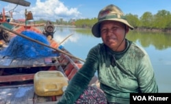 Bou Teap, a fisherwoman, lives near Kampot Multi-Purpose Port in Kilo 12 Village, Sangkat Koh Touch, Bokor City, Kampot Province on May 25, 2024. (Kann Vicheika/VOA Khmer)