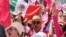 People participate in an opposition rally ahead of June 2 presidential elections, in Mexico City, Mexico, May 19, 2024.