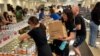 USA, Bethesda, Nourishing Bethesda, school kids packing food for the ones who need it