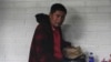 Rigoberto Roman Miranda Orozco, who allegedly helped coordinate a human smuggling effort that ended with 53 migrants dead, sits in a cell at a courtroom in Guatemala City, Aug. 21, 2024.