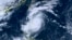This satellite image provided by courtesy of the National Institute of Information and Communications Technology (NICT) shows Typhoon Saola moving north towards Taiwan, Aug. 29, 2023. 