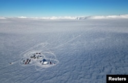 The Ice Memory drilling camp, where scientists found a pool of water 25 meters deep, is seen at 1,100 meters (3,600 feet) above sea level in the Holtedahlfonna icefield, near Ny-Aalesund, April 10, 2023.