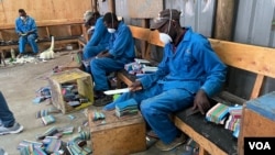 Artist carvers upcycle components of discarded flip-flops, at Ocean Sole, in Karen, Kenya, Jan. 17, 2024. (Mariama Diallo/VOA)