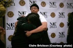 Tajaih Robinson of Wake Forest University hugs teammate Iyana Trotman and associate coach Amber Kelsie after winning the National Debate Tournament in Chantilly, Virginia, Tuesday, April 4, 2023. (Photo courtesy of Claire Brickson)