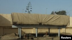 Egyptian soldiers stand guard near the Rafah Crossing at the Egypt-Gaza border, in Rafah, Egypt, July 4, 2024.