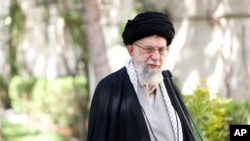 In this picture released by the official website of the office of the Iranian supreme leader, Supreme Leader Ayatollah Ali Khamenei speaks at the courtyard of his office in Tehran, Iran, March 6, 2023.