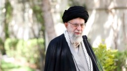In this picture released by the official website of the office of the Iranian supreme leader, Supreme Leader Ayatollah Ali Khamenei speaks at the courtyard of his office in Tehran, Iran, March 6, 2023.