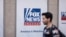 A person walks past the Fox News Headquarters in New York, April. 12, 2023. 