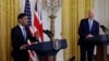 U.S. President Joe Biden listens as Britain's Prime Minister Rishi Sunak addresses a joint news conference in the East Room at the White House in Washington, June 8, 2023.