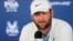 FILE - Scottie Scheffler speaks during a news conference after the second round of the PGA Championship golf tournament at the Valhalla Golf Club in Louisville, Kentucky, May 17, 2024.