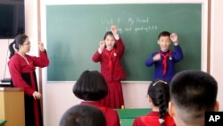 FILE - Schoolchildren at Jon U Junior Middle School take an English lesson in the Moranbong District of Pyongyang, North Korea, March 21, 2024.