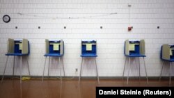 (FILE) Voting booths are pictured in the United States.