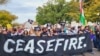 Pro-Palestinian protesters hold a banner with the inscription 'Cease-fire' as they make their way to the U.S. Capitol in Washington on Wednesday Oct. 18, 2023. 