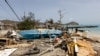 Scattered debris clutters the waterfront after Hurricane Beryl passed the island of Carriacou, Grenada, July 2, 2024. 