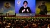 Hezbollah leader Sayyed Hassan Nasrallah addresses a speech via a video link, during a ceremony to mark seven years since the death of Hezbollah slain top commander Mustafa Badreddine, in the southern suburbs of Beirut, Lebanon, May 12, 2023.