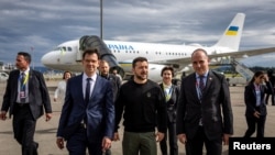 Ukrainian President Volodymyr Zelenskyy arrives at the Zurich airport in Switzerland, June 14, 2024.