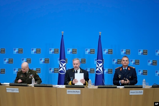 Chair of the NATO Military Committee Admiral Rob Bauer, center, Supreme Allied Commander Europe, General Christopher Cavoli, left, and Supreme Allied Commander Transformation General Chris Badia prepare to talk to the press in Brussels, Jan. 18, 2024.