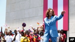 U.S. Vice President Kamala Harris waves as she arrives at Black Star square to address young people in Accra, Ghana, March 28, 2023.