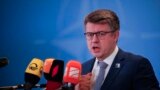 FILE - Latvia's Foreign Minister Edgars Rinkevics talks to journalists during the meeting of NATO Ministers of Foreign Affairs, in Bucharest, Romania, Nov. 30, 2022. 