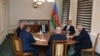 Representatives of the Armenian community of Nagorno-Karabakh, Azerbaijan's government and a representative of the Russian peacekeeping contingent attend the talks in the Azerbaijani city of Yevlakh, Azerbaijan, Sept. 21, 2023.