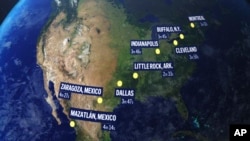 FILE - A total solar eclipse April 8 will enter over Mexico's Pacific coast, dash up through Texas and Oklahoma, crisscross the Midwest, Mid-Atlantic and New England, before exiting over eastern Canada into the Atlantic.
