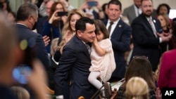 FILE - Assemblyman Anthony Rendon walks with his daughter Vienna before being sworn in as Speaker of the Assembly during the opening session of the California Legislature in Sacramento, Calif., Monday, Dec. 5, 2022. (AP Photo/José Luis Villegas, Pool,File)