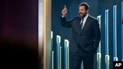 Mark Twain Prize recipient Adam Sandler is introduced at the start of the 24th Annual Mark Twain Prize for American Humor at the Kennedy Center for the Performing Arts on March 19, 2023, in Washington.