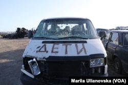 Одна із розстріляних росіянами машин у Бучі.