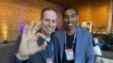 Alex Luebke, Vivek Kumbhari and the PillBot are pictured at the TED Conference in Vancouver, British Columbia, which was held April 15-19, 2024. (Craig McCulloch/VOA)