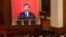 北京人大会堂的大屏幕上显示中国领导人习近平在全国人大闭幕式上讲话。（2023年3月13日）