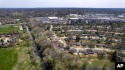 FILE - Coldwater Creek flows in Missouri, April 7, 2023. A new report released on Oct. 17, 2023, by the Government Accountability Office says that cleaning up 19 sites contaminated by Cold War era nuclear waste has risen $1 billion since a 2016 estimate.