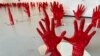 3D-printed hands created by Persian artist Kiana Honarmand and exhibited at the VisArts Gallery in Rockville, Md., symbolize hundreds of people killed by Iranian security forces for their involvement in protests following the death of Mahsa Amini. 