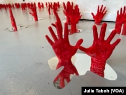 3D-printed hands created by Persian artist Kiana Honarmand and exhibited at the VisArts Gallery in Rockville, Md., symbolize hundreds of people killed by Iranian security forces for their involvement in protests following the death of Mahsa Amini.