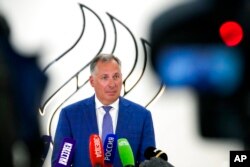 FILE - President of the Russian Olympic Committee Stanislav Pozdnyakov speaks during a news conference in Moscow, Russia, June 29, 2021.