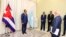 Somali President Hassan Sheikh Mohamud, left, receives credentials from Cuba’s ambassador to Somalia, Juan Manuel Rodriguez, in a photo posted on Twitter April 4, 2023, by @TheVillaSomalia, Mohamud's official Twitter account.