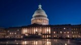 FILE: The U.S. Capitol is illuminated as the Senate worked into the night to finish votes on the debt ceiling and budget cuts package, in Washington, Thursday evening, June 1, 2023. 
