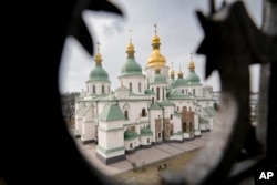 FILE - The Saint Sophia Cathedral, a UNESCO World Heritage Site is seen from a surrounding wall tower in Kyiv, Ukraine, Saturday, March 26, 2022. (AP Photo/Vadim Ghirda)