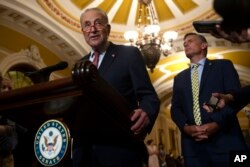 Senate Majority Leader Chuck Schumer, D-N.Y., speaks to the media, Tuesday, Sept. 12, 2023, on Capitol Hill in Washington.