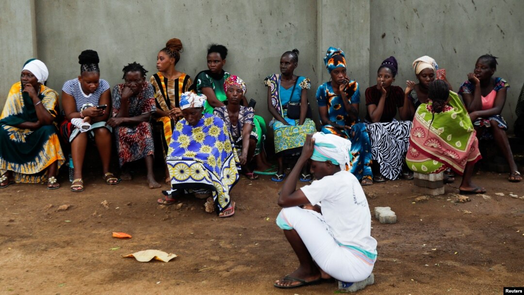 Relatives of followers of a Christian cult called Good News International Church, gather outside the mortuary in Malindi, Kilifi county, Kenya, April 27, 2023