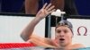 Leon Marchand of France, celebrates after winning the men's 200-meter individual medley final at the 2024 Summer Olympics, Aug. 2, 2024, in Nanterre, France. 