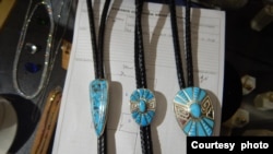 These turquoise bolo ties were marketed as Native American-made but actually imported from the Philippines in violation of the 1990 Indian Arts and Crafts Act. (Courtesy U.S. Fish and Wildlife Service Office of Law Enforcement)