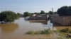 FILE - Homes are submerged in water after a massive flooding in N'djamena, Chad, Oct. 14, 2022. Severe flooding in Chad since July has claimed 503 lives and affected around 1.7 million since July, the United Nations said Saturday in its latest assessment of the disaster. 