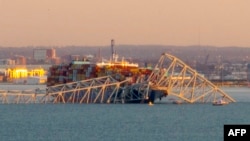 美国马里兰州巴尔的摩的弗朗西斯·斯科特基大桥星期二凌晨被一艘集装箱货船撞毁。（2024年3月26日）