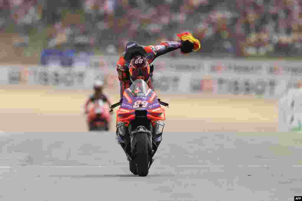 Ducati Spanish rider Jorge Martin celebrates after winning the MotoGP race of the Portuguese Grand Prix at the Algarve International Circuit in Portimao, Portugal.