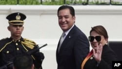 President of Honduras Xiomara Castro waves as she arrives to attend President Nayib Bukele's inauguration ceremony, in San Salvador, El Salvador, June 1, 2024. 