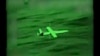 FILE - This handout screengrab of a video taken and released by the French 'Etat-Major des Armees' on March 20, 2024, shows a Houthi UAV threatening commercial navigation in the Red Sea. 