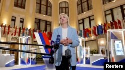 FILE — Yekaterina Duntsova speaks in Moscow, Russia, Dec. 20, 2023. On Saturday, the former TV journalist was disqualified as a candidate for Russia's presidential election. She planned to run on a platform of opposing the war in Ukraine.