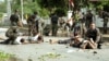 FILE - Thai soldiers apprehend some of hundreds of men after demonstrators clashed with police outside the Tak Bai police station in Thailand's Narathiwat province, some 1150 km south of Bangkok, Oct. 25, 2004.