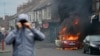 A car burns during an anti-immigration riot in Middlesbrough, England, on Aug. 4, 2024.