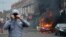 A car burns during an anti-immigration riot in Middlesbrough, England, on Aug. 4, 2024.